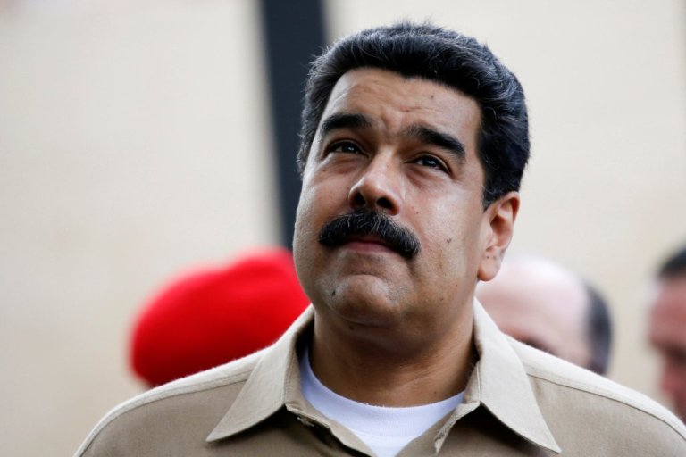 Venezuela's President Nicolas Maduro waits the arrival of Colombia's President Juan Manuel Santos at Macagua Hydroelectric compound in Puerto Ordaz, Venezuela, August 11, 2016. REUTERS/Carlos Garcia Rawlins