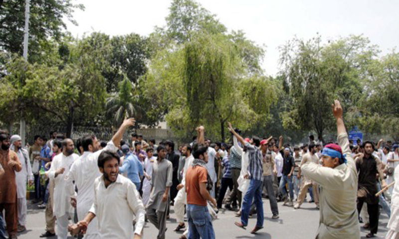 LAHORE, PAKISTAN, MAY 18: Supporters of Islami Jamiat Talba (IJT) are protesting against killing of student in Punjab University (PU) during demonstration at Mall road in Lahore on Friday, May 18, 2012. (Babar Shah/PPI Images).