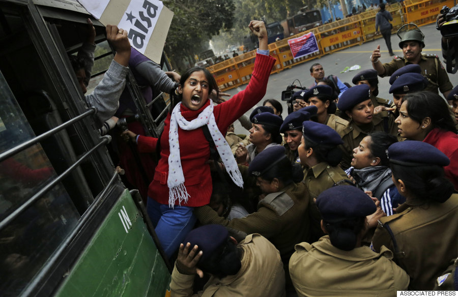 An Indian student shouts slogans demanding resignation of Indian education minister as she is detained by police during a protest against the death of student Rohith Vemula in New Delhi, India, Wednesday, Jan. 27, 2016. The students were protesting the death of Vemula, who, along with 4 others, was barred from using some facilities at his university in the southern tech-hub of Hyderabad. The protesters accused Hyderabad University's vice chancellor along with two federal ministers of unfairly demanding punishment for the five lower-caste students after they clashed last year with a group of students supporting the governing Hindu nationalist party. (AP Photo/Altaf Qadri)
